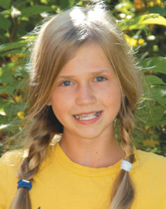 Girl with braces smiling